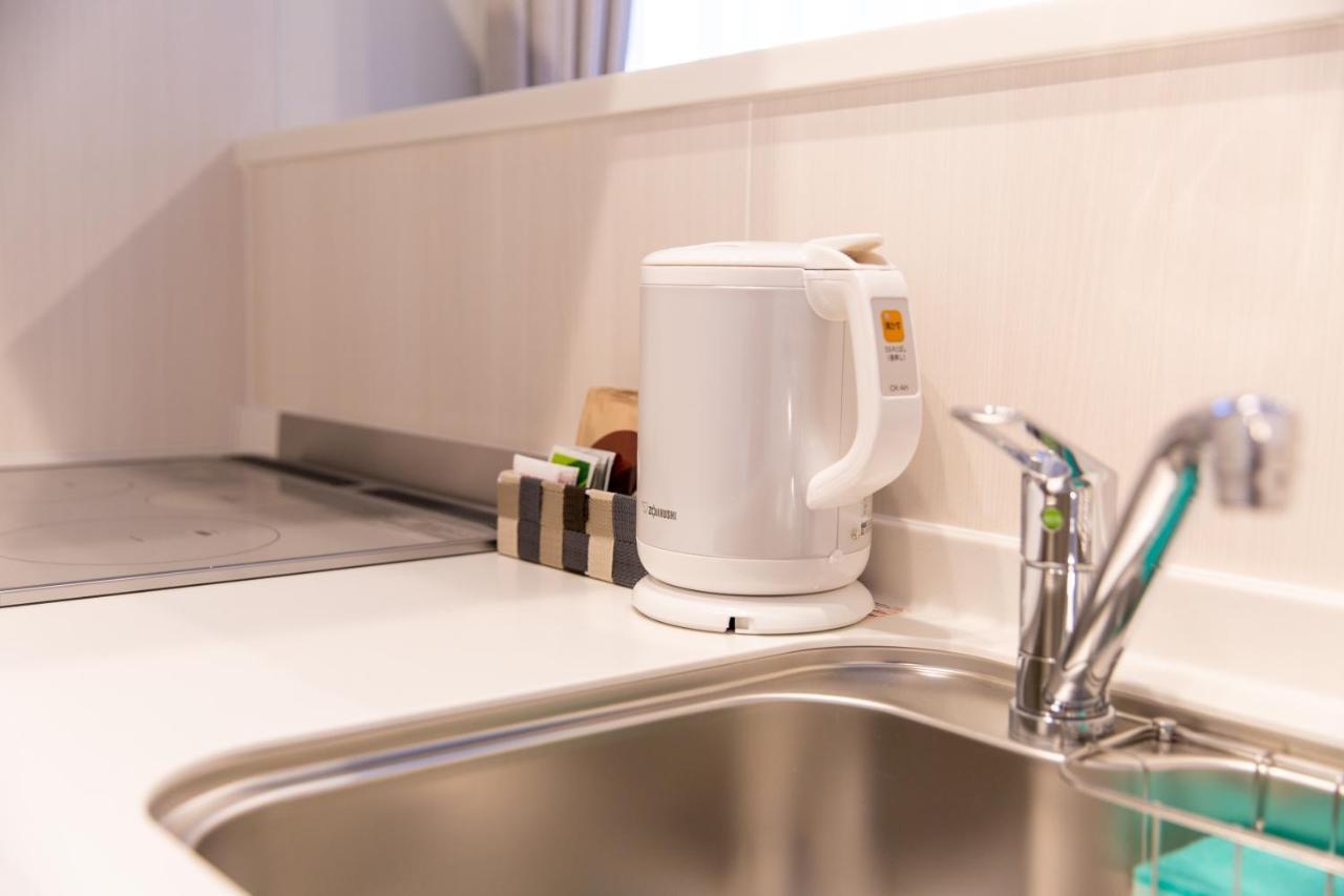 Grand Base Hiroshima Ekimae Aparthotel Екстериор снимка